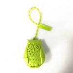 Tea filter, infuser, owl form, green color